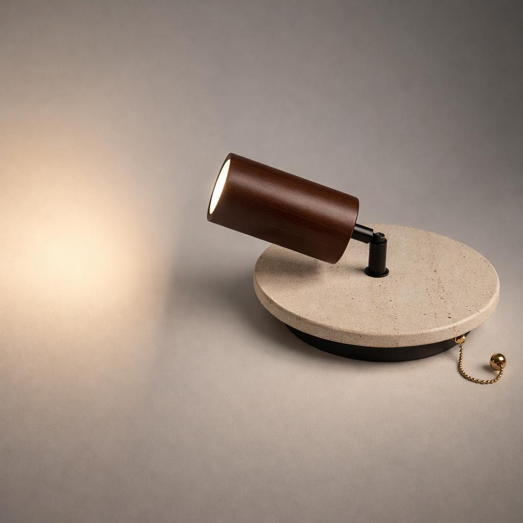 Brim Travertine 2-in-1 indoor wall light with dark wood cylindrical shade, brass pull cord, and soft directional light.