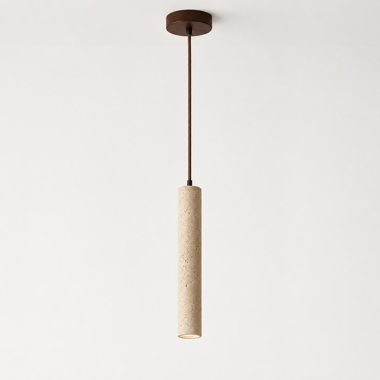 Slender Moss natural travertine pendant light with a walnut braided cord and matching canopy.