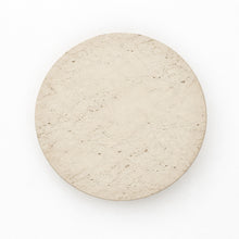 Shore Travertine Halo Wall Light, a smooth circular light beige travertine form with subtle texture.