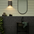 Wisp Travertine Up/Down Wall Light in Black Stone