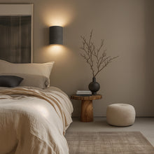 Wisp Travertine Up/Down Wall Light in Black Stone